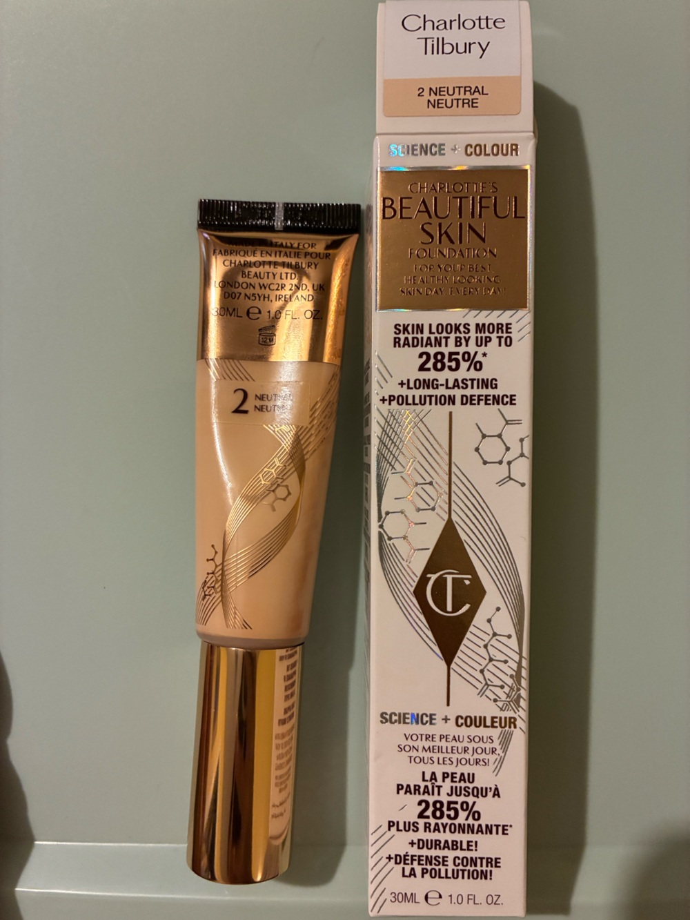 Charlotte Tilbury Foundation Tube in Neutral Beige with Gold Accents
